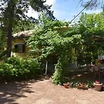 The Pretty House Next To The Potamion
