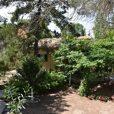 The Pretty House Next To The * Potamion